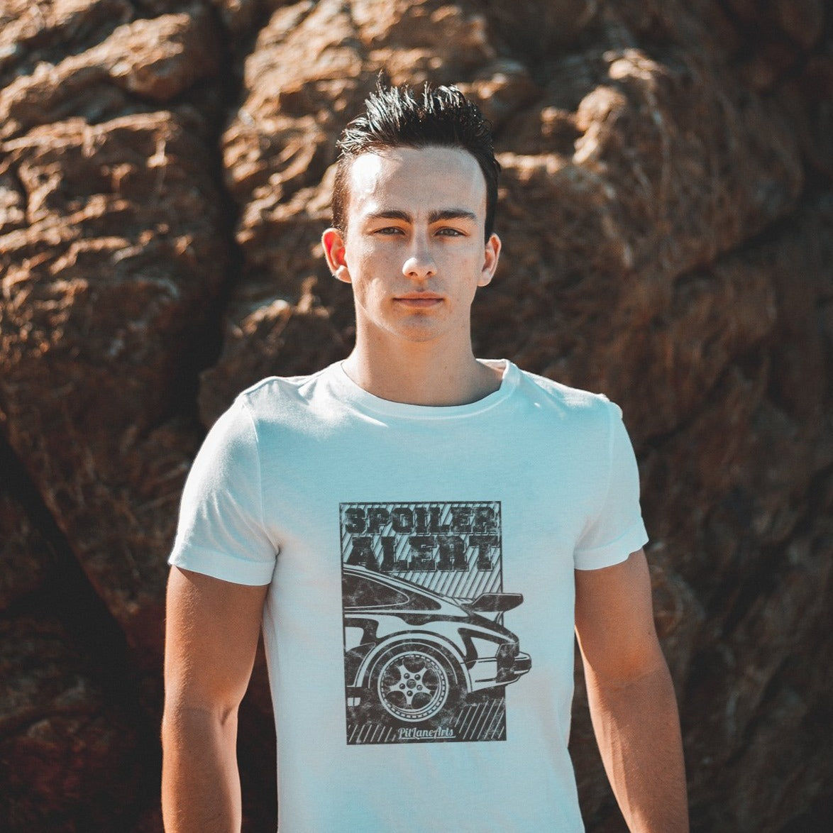 Young man wearing a white Classic 911 Turbo T-shirt