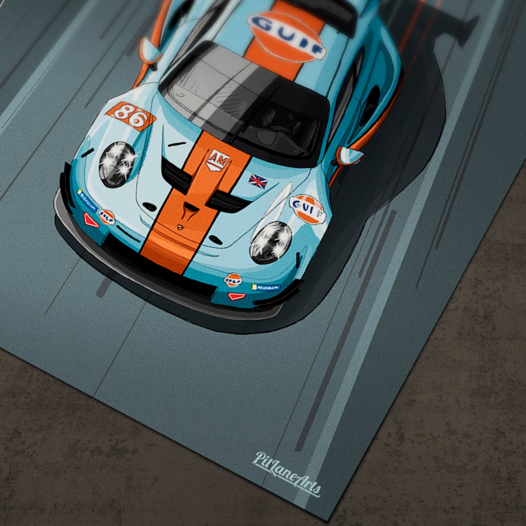 Porsche 911 RSR art print shown on the floor.