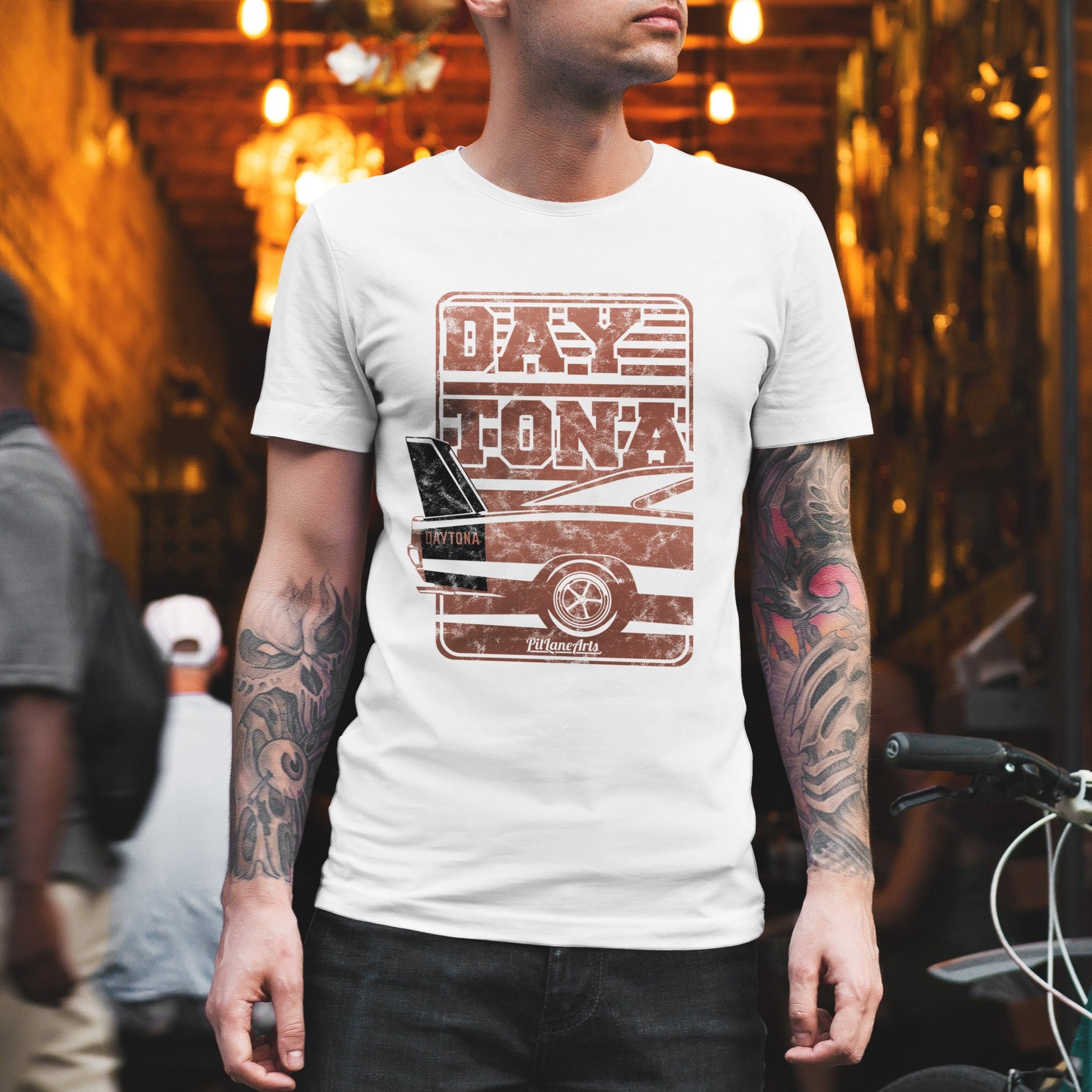 Man wearing a white Daytona Tshirt
